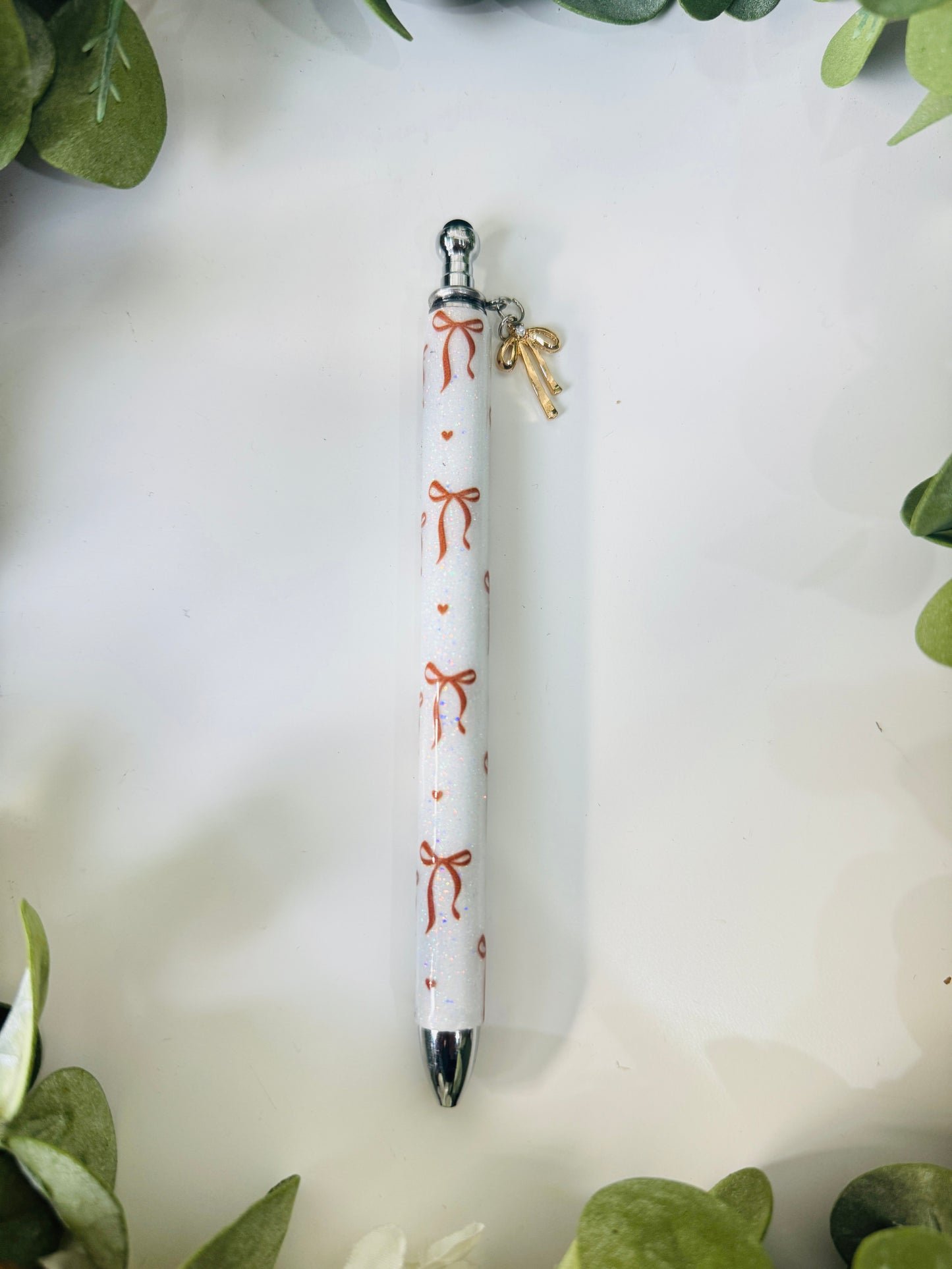 (RTS) COQUETTE BROWN PEN W CHARM